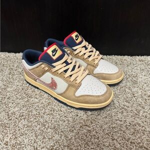 Nike dunk low retro SE in Tan, Cream & Navy with Red Swoosh. Lightly worn.